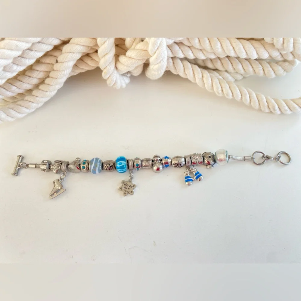 3 for $25 pick and bundle.  🏡🏡🏡 Happy New Year Charm Bracelet